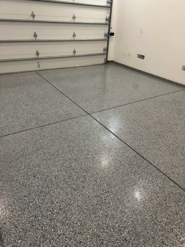 Finished epoxy garage floor with flake coating in Cheviot Hills